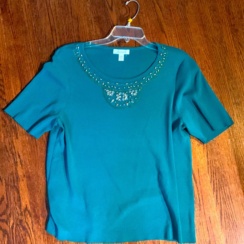 Bead-detail blouse.